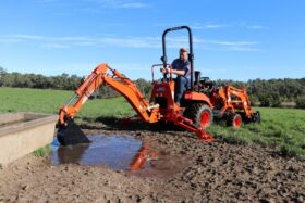 kioti-cs2610hst-package-deal-tractor-fitted-with-kioti-backhoe-and-kioti-60-underbelly-mower